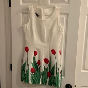 Spring has arrived with this adorable Accent A line dress!